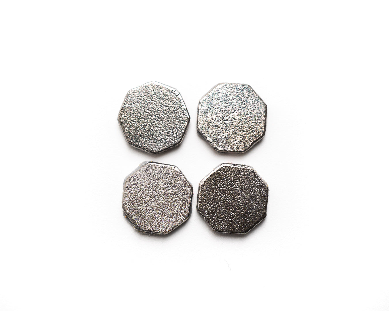 Set of four EMF protection tags designed for tablets and laptops