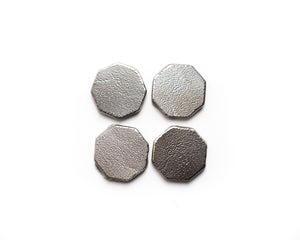 Set of four EMF protection tags designed for tablets and laptops