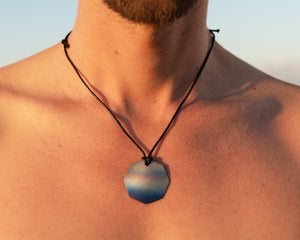 Octagonal Bio energy Personal Pendant positioned over Thymus area.