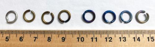 Titanium link for wearing your Tesla's Pendants on a metallic chain.